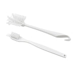 Cleaning brush with ergonomic handle on plain background