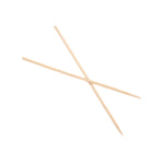 Close-up view of bamboo BBQ skewers holding food on a grill.