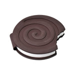 Hand holding the compact round Chocolate Diary, highlighting its portable size.