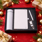 Premium 4-in-1 corporate gift set including bottle, notebook, pen, and keychain