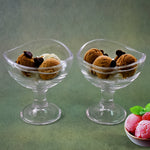 Elegant glass dessert bowl on a footed base, perfect for serving.