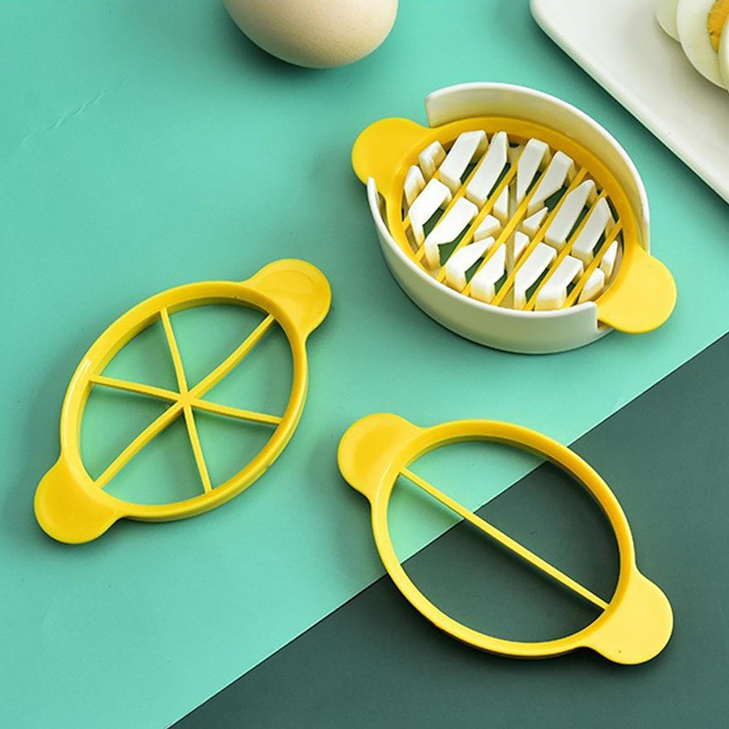 The compact Quickslice egg slicer resting on a clean surface, highlighting its dimensions.