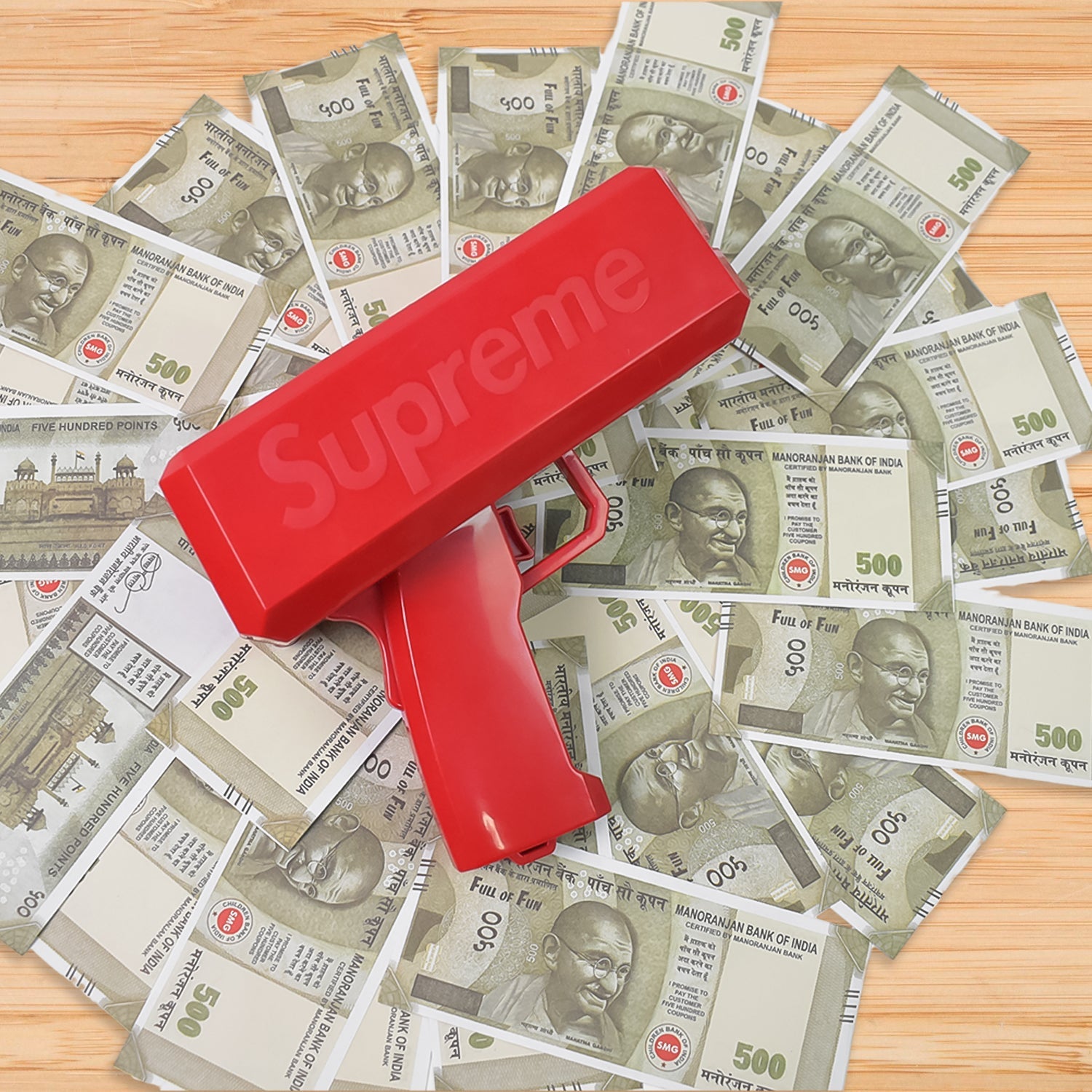 Money gun shooting play money bills at a lively party.