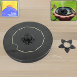 A solar floating water fountain spraying water in a clear pond, showcasing its simple design.