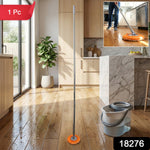 Spin mop handle attached to bucket for effortless home cleaning