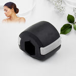 Angled view of the black Jaw Exerciser, highlighting its ergonomic design.