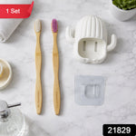 Wall mounted cactus style toothbrush holder with two bamboo toothbrushes