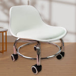 Compact and ergonomic rolling stool with wheels suitable for various home and office tasks.