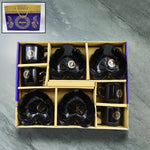A One 8-piece ceramic tea cup set with leaf-shaped serving bowls arranged on a white surface.