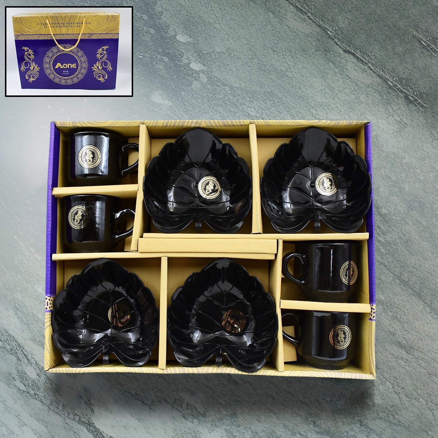 A One 8-piece ceramic tea cup set with leaf-shaped serving bowls arranged on a white surface.
