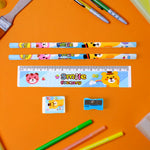 All items from the wooden stationery set for children neatly arranged.