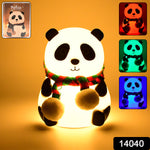 Adorable silicone panda night light with eyes closed, perfect for a child's bedroom.
