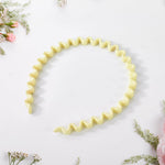 Simple snap-fit plastic hairband for secure hair holding