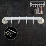Wall-mounted bath towel hanger securely holding clean towels in a modern bathroom.