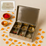 Front view of the closed stainless steel jewelry organizer with engraved lid.