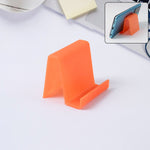 Compact plastic smartphone stand side profile showing design
