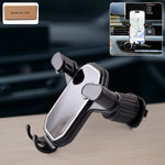 Gravity car phone holder mounted on air vent, side view showing secure grip