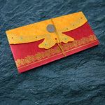 Elegant money gift cover featuring a festive pattern, ideal for auspicious occasions.