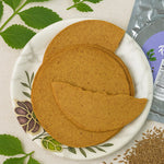 Pack of Maniarr's Carmonised Ragi Khakhra (180g) showing crispy texture.