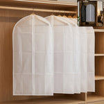 Main view of foldable non-woven suit cover set showing full-length zipper and breathable fabric.