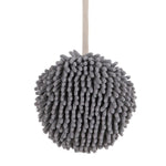 Plush hanging hand towel with convenient loop for easy placement.