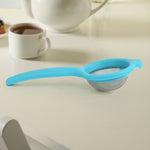 Kadak stainless steel mesh tea strainer with plastic handle on white background