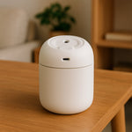 Close-up of the compact Mini USB Humidifier's modern aesthetic.