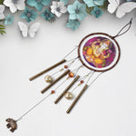 Decorative detail of Ganesh Harmony wind chimes with metal bells