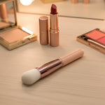 Makeup brush used for foundation and blush application with soft synthetic bristles
