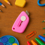 Mini Cloud Cutter utility knife cutting open an envelope safely and easily