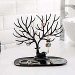 Side view of deer shaped jewellery holder showcasing antler branches and oval tray