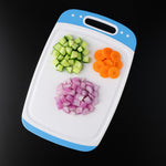 Pro Clean plastic chopping board with non-slip surface for safe vegetable preparation.