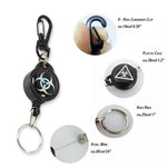 Compact retractable key chain holding keys and an ID card, demonstrating its use.