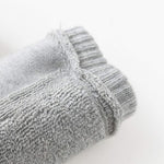 Grey toddler wool knit knee protectors ideal for crawling and play activities