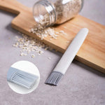 Versatile silicone oil brush perfect for cooking, baking, and grilling tasks.