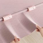 Bed sheet clip keeping bedding securely in place and wrinkle-free
