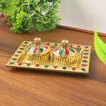 Close-up of the durable plastic pooja thali showcasing its traditional design.