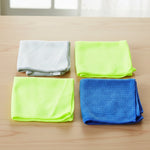 Neatly folded microfiber cloths on surface