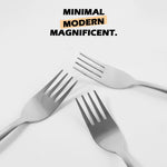 Stainless steel dinner forks featuring ergonomic handles for comfortable grip.