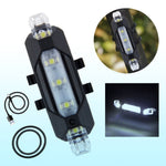 Rechargeable LED bicycle safety light mounted on a bike handlebar and seat post for visibility.