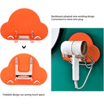 Self-adhesive hair dryer holder showing easy installation on a tiled wall.
