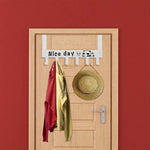 Over door rack loaded with clothes and bags showcasing heavy-duty hook strength