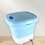 Detailed view of the portable washing machine's user-friendly control panel.