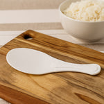White non-stick rice serving paddle with smooth ergonomic handle