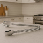 Stainless steel serving tong with spoon and fork ends for multipurpose use