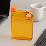 Front view of the Own Hydrate slim water bottle, showcasing its innovative notebook design.