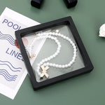 Clear floating jewellery display case with magnetic lock