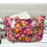 The compact foldable travel bag shown neatly folded for easy storage or packing.