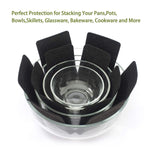 Pots and pans stacked with felt protectors between to avoid scratches and damage