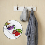 Set of six transparent adhesive wall hooks organized neatly for home and office use.